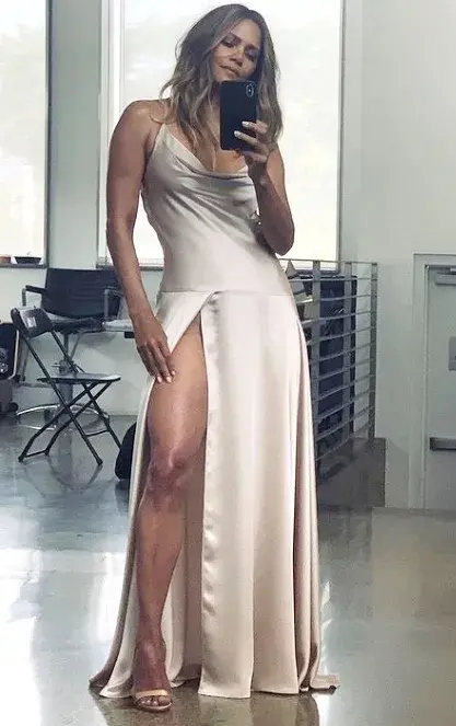 Halle Berry shares mirror selfie in a sexy high slit dress