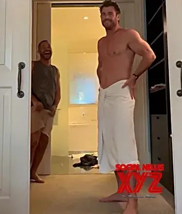 Chris Hemsworth shows off muscles wearing nothing but towel